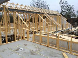 Loft room and roof timber stud work coming together on Cambridge new build bungalow