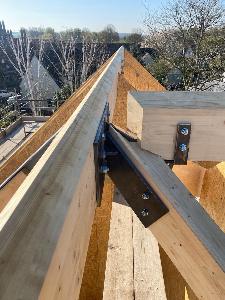 Ridge work on this timber SIPs new build south of Cambridge.