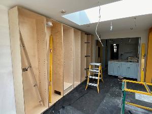 The carcass for the bespoke full height cupboards goes in on this central Cambridge Victorian terrace house refurbishment.