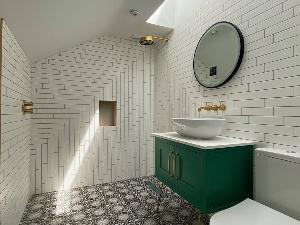Wonderful tile selections in this en-suite bathroom for the converted loft of this central Cambridge Victorian terrace house refurbishment.