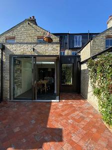 The original quarry tiles lead out of the rear extension of this central Cambridge Victorian terrace house refurbishment.